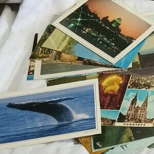 Collection of vintage postcards, some of which are very old
